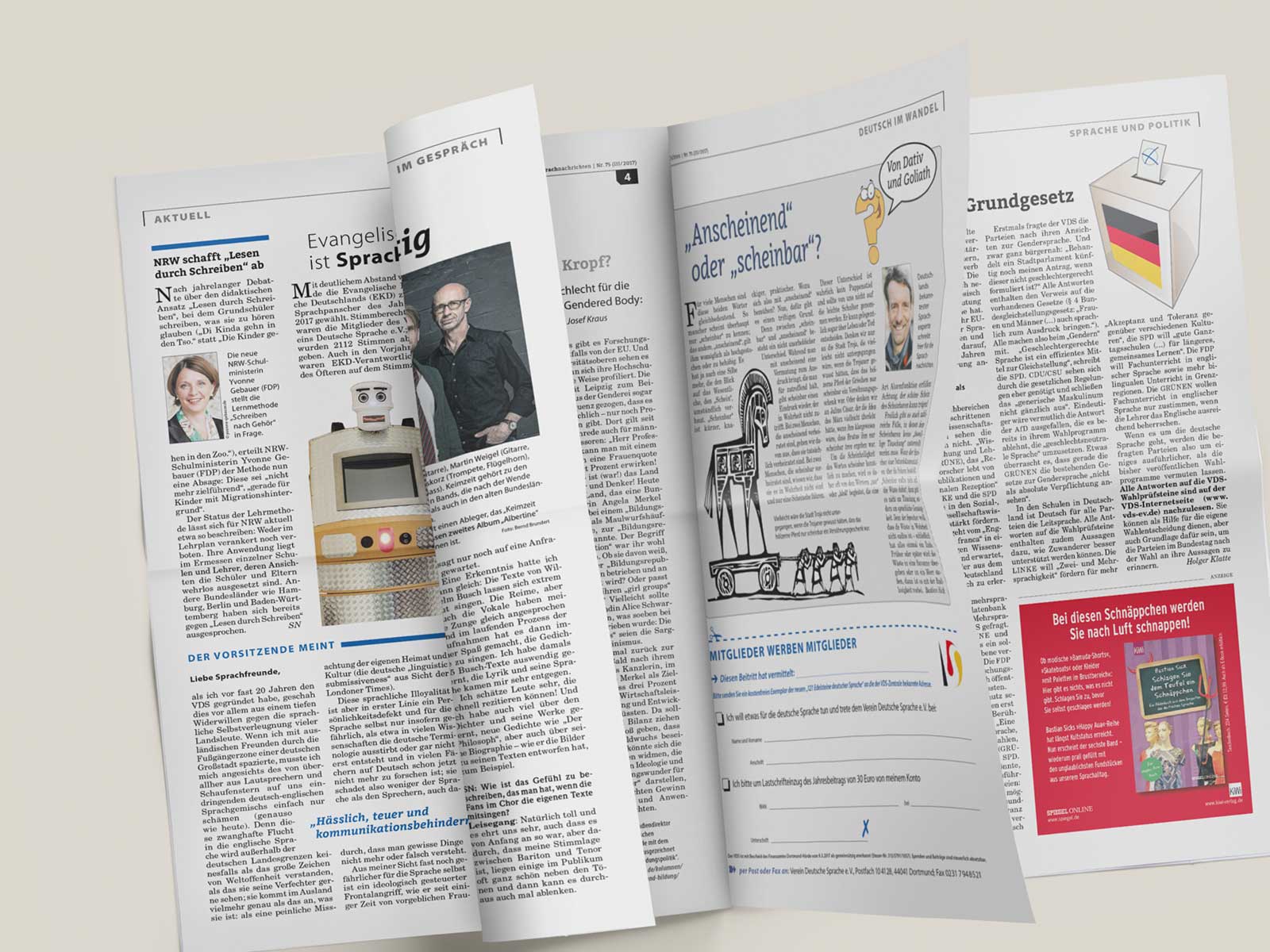 Zeitungslayout mit mehreren aufgeschlagenen Seiten